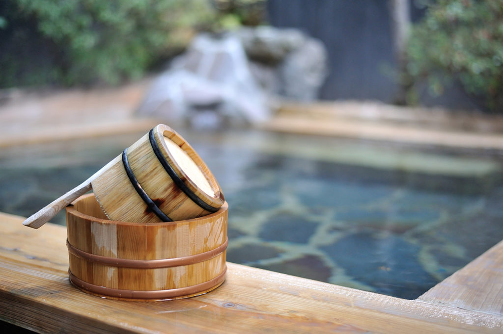 Onsen with bamboo bucket